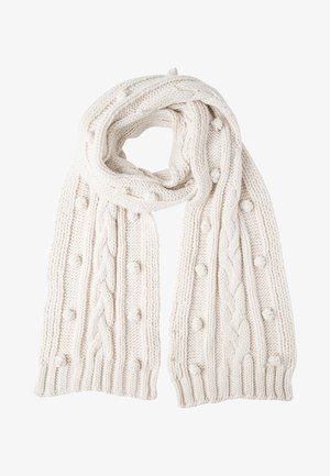 Écharpe tricotée couleur crème avec motifs torsadés et détails en relief en forme de boules, pliée en boucle.