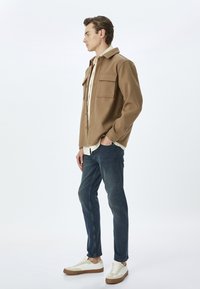 Koton - Jeansy Slim Fit
