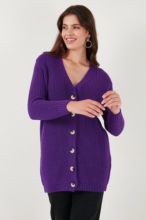 Purple knitted cardigan with a V-neck, long sleeves, and five large round buttons down the front. Textured fabric and ribbed cuffs.