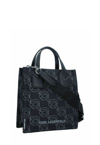 Schwarze Handtasche mit wiederholten weißen Grafiken eines Gesichts, das eine Sonnenbrille trägt. Verfügt über zwei Griffe, einen abnehmbaren Riemen und Logo-Details.