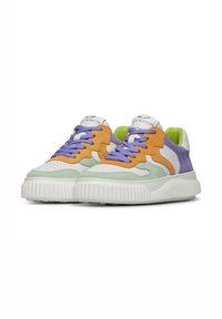 Multicolored sneakers featuring orange, green, purple, and white suede and leather, with thick white rubber soles and distinct lacing system.