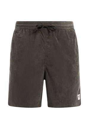 Donkergrijze corduroy shorts met elastische tailleband en zwart trekkoord, voorzien van een klein wit logoplaatje bij de zoom aan het rechterbeen.