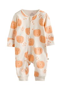 Kremasto obarvan otroški bodi z dolgimi rokavi, z vsem telesom prekrito z odtisom buč v oranžni in zeleni barvi, z zadrgo spredaj. Mehki bombažni material.