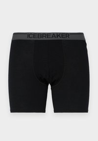 Črne bokserice iz mehkega materiala, s sivim pasom, na katerem je v črni pisavi napis "ICEBREAKER". Gladka tekstura in prilagojena zasnova.