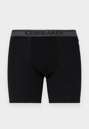 Sorte boksertruser laget av myk tekstil, med en grå midje med "ICEBREAKER" i svart skrift. Glatt tekstur og tettsittende design.