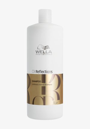 Wella Professionals Oil Reflections shampoofles met gouden label met de tekst "Luminous reveal shampoo," inhoud 1 liter, witte kunststof verpakking.
