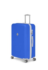 Harde koffer in felblauw, met een geometrisch patroon, zilveren ritssluiting en een telescopische handgreep aan de bovenkant. Vier wielen voor eenvoudige mobiliteit.