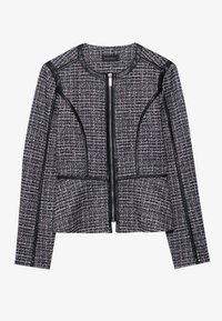 Black and white tweed jacket with a structured design, zip closure, leather accents, and two pockets on the front.