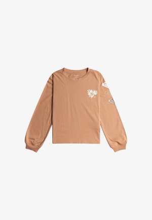 Camicia in cotone a maniche lunghe di colore marrone chiaro con grafica floreale bianca sul petto e sulle maniche, con polsini a costine e scollatura rotonda.
