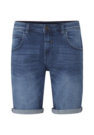 Faded tumesinised teksapüksid nööpide ees ja õmmeldud taskutega. Keeratud ääred rõhutavad hemmi, luues lihtsa välimuse.