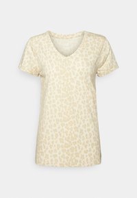 Camiseta de manga corta con escote en V en color beige claro con un sutil estampado de leopardo. Fabricada en un tejido suave y con una silueta relajada.