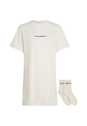 Cremfarbener T-Shirt mit kurzen Ärmeln aus Baumwolle, mit einem schwarzen "KARL LAGERFELD" Logo über der Brust. Dazu passende cremfarbene Socken.