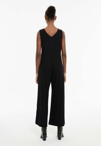 System Action MONOS - Jumpsuit - black