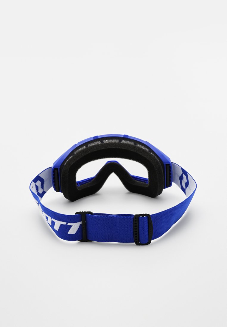 Blaue Skibrillen mit einem strukturierten schwarzen Schaumstoff-Innenfutter, flexiblem Rahmen und verstellbarem Riemen mit weißer Markenprägung.