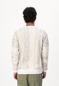 Carlo Colucci Trui - beige