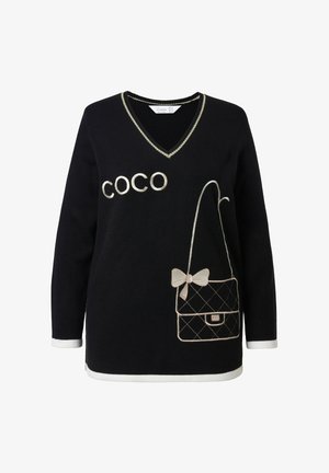 Un pull noir avec un col V, des bordures blanches et un grand texte "COCO". Design de sac à main brodé avec un nœud et un motif matelassé.