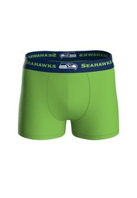 Boxers verdes con una cinturilla azul marino que presenta el texto y el logo de "Seahawks". Tela suave, diseño ajustado y longitud a mitad del muslo.