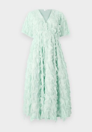 Mint green dress with short flutter sleeves, V-neck, and a textured design featuring layered fringe details, falling to the ankle.