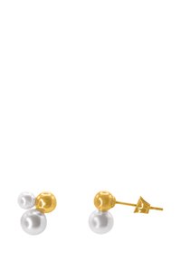 Boucles d'oreilles en or et en argent dotées de deux perles rondes, une en or et une en argent, avec un élégant système de fixation à tige. Texture lisse, design minimal.