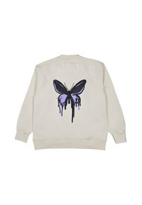 Felpa crema con una grande grafica di una farfalla gocciolante nera e viola e il testo sbiadito "DISCLAIMER" sulla parte superiore della schiena.