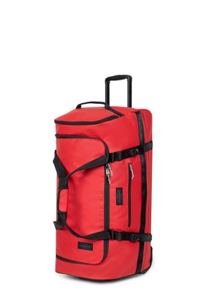 Red nylon wheeled duffel bag with black accents, featuring two side zippers, top handle, and pull-out telescopic handle for easy transport.