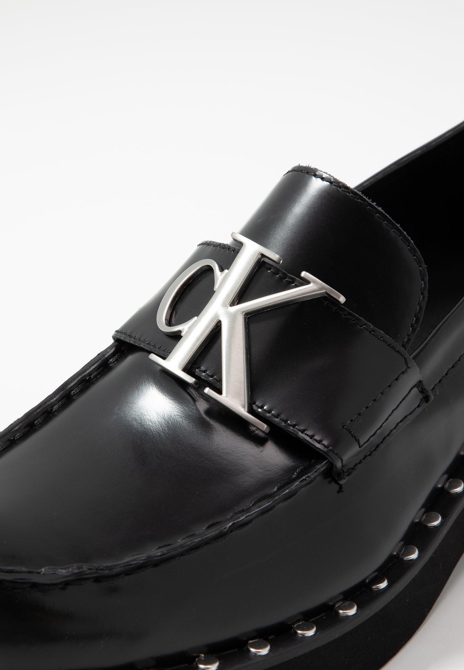 calvin klein slip ons