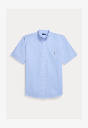 Svetlomodrá a biela pruhovaná košeľa s krátkym rukávom, zapínaná na gombíky, s náprsným vreckom s malým vyšívaným logom.
