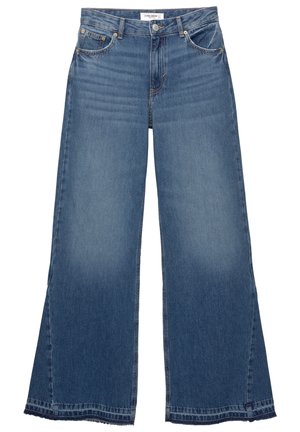 Blå vida denimjeans med framfickor, bälteöglor, knappstängning och subtil blekning på låren och nedre benen.