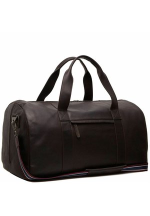 Dark brown leather duffel bag with dual handles, a front zippered pocket, and a striped detachable shoulder strap. Smooth texture, structured shape.
