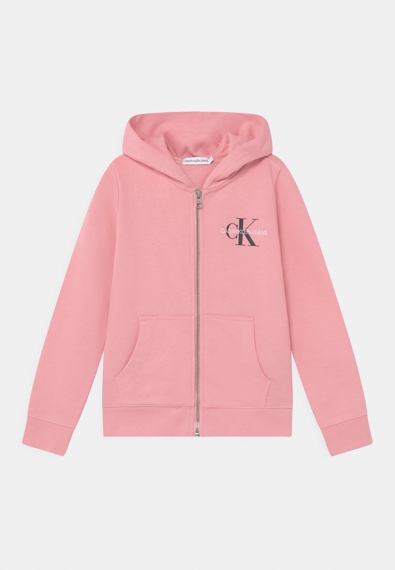 Sweat à capuche rose zippé avec poches avant, capuche et logo noir "CK Calvin Klein Jeans" sur la poitrine gauche.