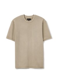 T-shirt in cotone beige con scollatura rotonda e maniche corte. Presenta una texture morbida e una vestibilità standard. Nessun motivo o dettaglio visibile.