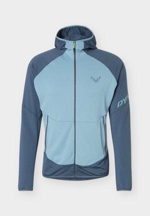 Veste à capuche pour homme à fermeture éclair intégrale en bleu clair et bleu foncé avec poches latérales, manches longues et petit logo sur la poitrine et la manche.