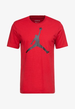 Tricou roșu din bumbac cu un grafic negru în silueta "Jumpman", design cu gât rotund și mâneci scurte, cu o textură netedă.