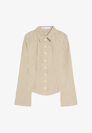 Bézs hosszú ujjú, gombos ing fekete kockás mintával, hegyes gallérral és testhez simuló szabással.