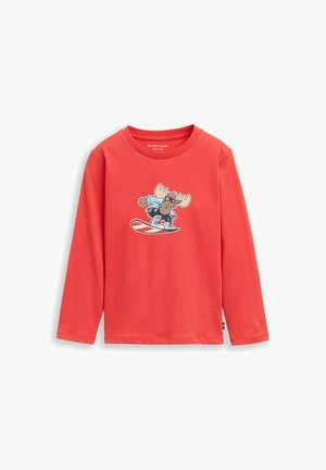 Long-sleeve coral t-shirt made of soft fabric, featuring a cartoon moose graphic on a snowboard at the center. Tag visible at the hem.