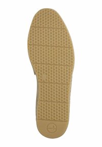 Suola in gomma con un design decorato, caratterizzata da texture circolari e scanalature orizzontali, di colore beige chiaro, con un logo del marchio.