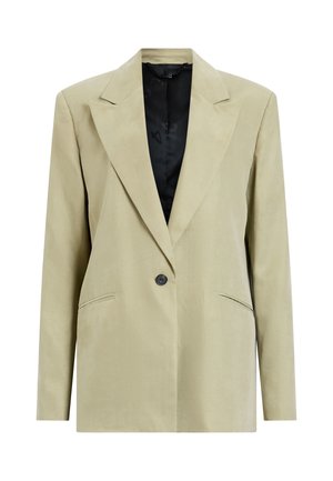 Beige blazer med skräddarsydd design, slagkrage, enkel knappstängning och två framfickor. Insidan är svart.