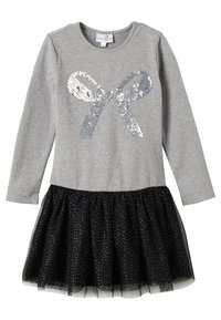 Šedé dlouhé šaty s dlouhým rukávem, zdobené flitrovou mašlí, a sukně z černého tylu s bílými puntíky. Měkký bavlněný materiál.