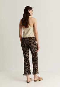 Scalpers LEO PRINT - Bukser - animal print