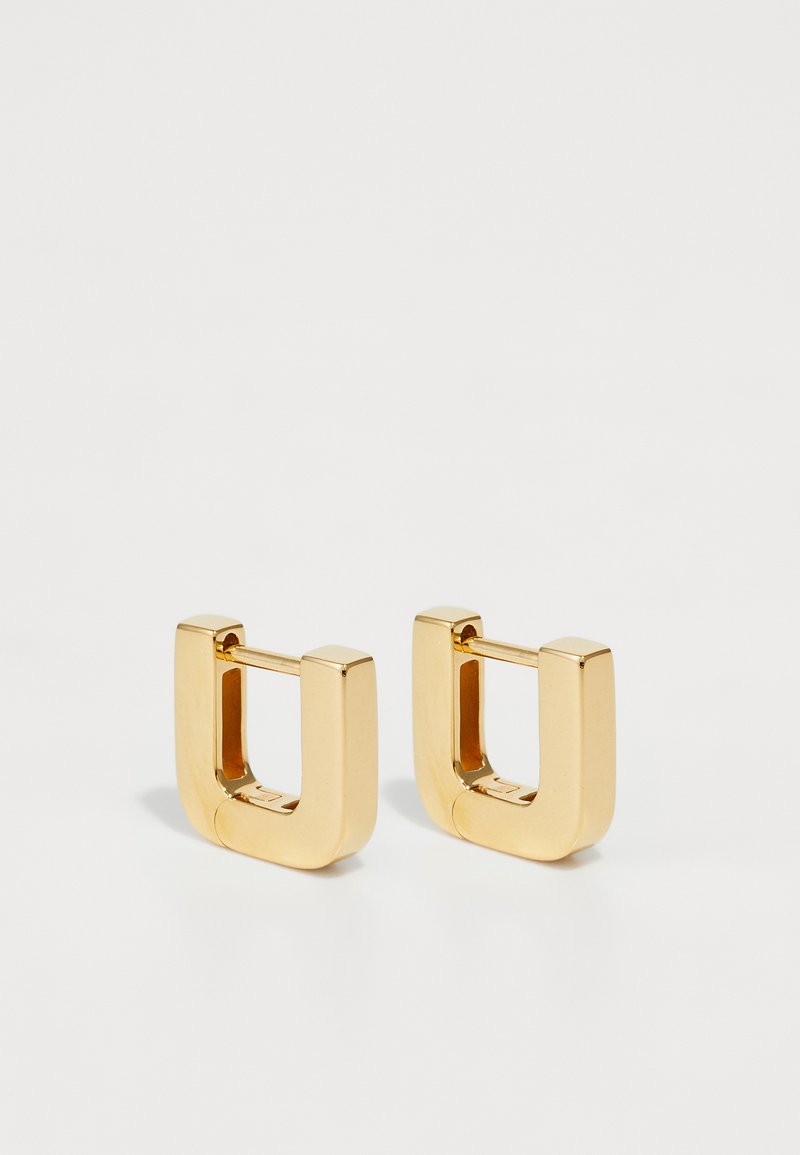 Goldfarbene, metallische quadratische Hängeohrringe mit glänzender Oberfläche. Sie verfügen über ein sauberes, minimalistisches Design und einen sicheren Klickverschluss.