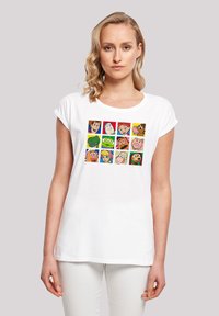 White short-sleeve t-shirt featuring a colorful graphic print of animated characters arranged in a grid of twelve square panels.