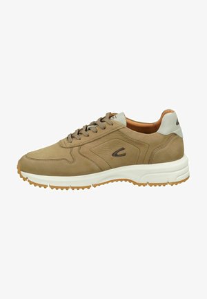 Brown suede sneaker with a white midsole, round toe, grey heel cap, and textured laces. Features a side logo and rubber traction outsole.