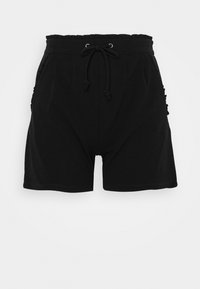 Black shorts with a ruffled elastic waistband, drawstring closure, and side pockets adorned with textured detailing. Soft fabric.