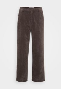 Bruine corduroy wijde broek met een textuurafwerking, voorzien van een standaard tailleband en twee vo pockets.
