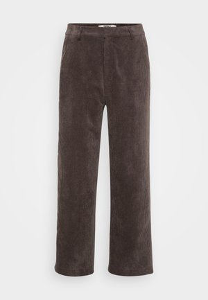 Brune corduroy vide bukser med en teksturert finish, med en standard midjebånd og to frontlommer.
