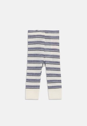 Leggings rayés en blanc, bleu et marine. Tissu doux et léger avec des poignets élastiques aux chevilles et une texture subtile grâce au tissage du tissu.
