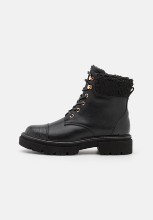 Bottines à plateau - black