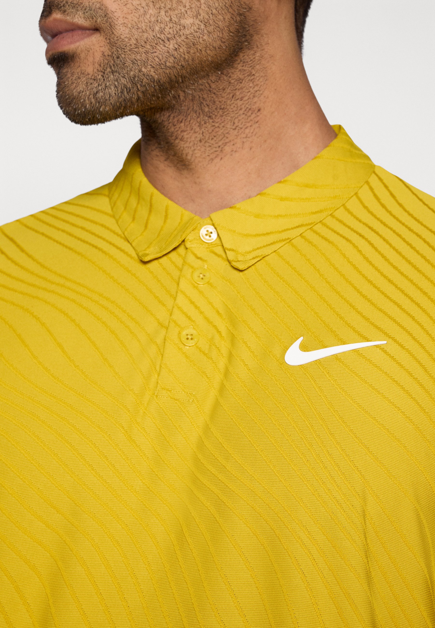 Nike Performance NIKECOURT ADVANTAGE SLAM - Polo shirt - saffron