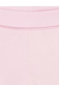 Rosa Baumwollleggings mit einem weichen, elastischen Bund und glatter Textur, ohne sichtbare Muster oder Hardware-Details.