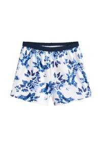 Floral-patterned shorts with blue flowers on a white background, featuring an elastic navy waistband and a soft cotton texture.
